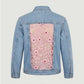 Denim jacket with floral lace panel on a light gray background