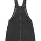 Black denim pinafore dress on a white background