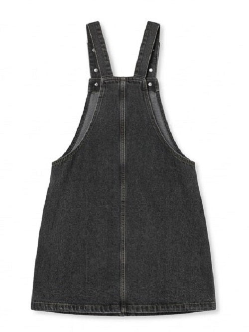 Black denim pinafore dress on a white background