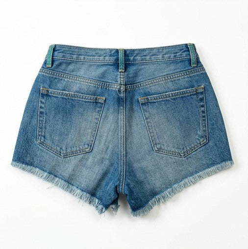 Blue denim shorts on a white background