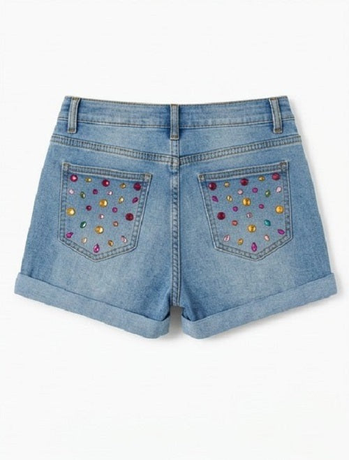 Blue denim shorts with embellished pockets on a white background