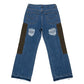 Blue jeans with patchwork design on a white background