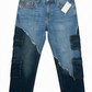 Blue jeans with patchwork design on a white background