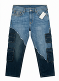 Blue jeans with patchwork design on a white background