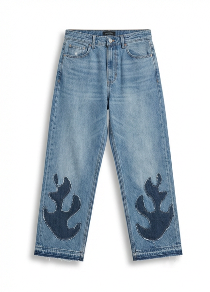 Front view of Wildgeese wave-form appliqué jeans in raw edge indigo patchwork denim, premium handcrafted sustainable fashion.