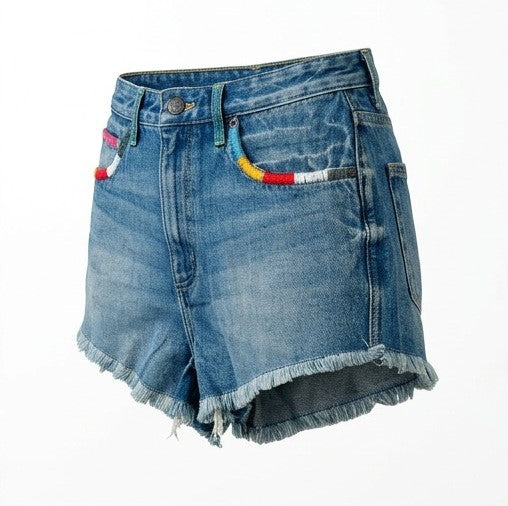 Blue denim shorts with colorful patch on a white background