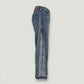Blue jeans with a zipper detail on a light gray background