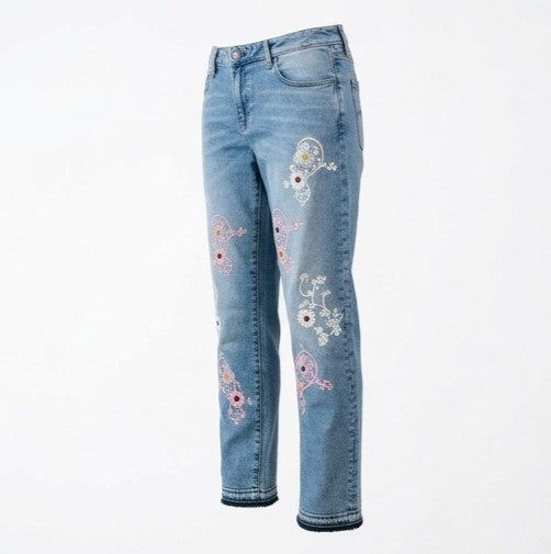 Light blue jeans with floral embroidery on a white background