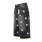 Black denim skirt with white floral patterns on a white background